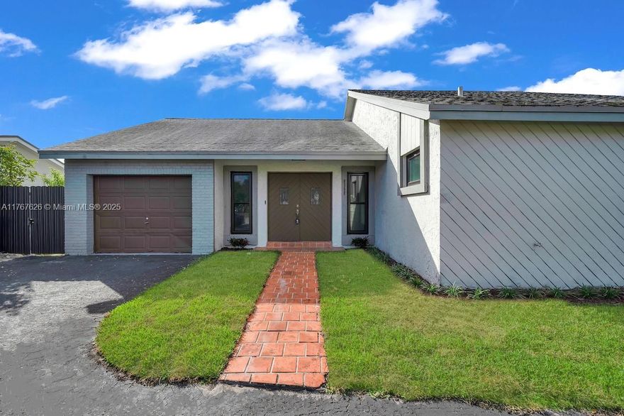 Experience waterfront living in this beautifully updated 3-bed, 2-bath home in Pembroke Pines! Nestled on a large lot, this gem features new wood floors, remodeled baths, impact windows, and a newer roof for worry-free living. Enjoy breathtaking lake views from your covered terrace, perfect for relaxing or entertaining. The home has been freshly painted inside and out, adding to its move-in-ready appeal. A 1-car garage and spacious yard complete this exceptional property. Conveniently located near top schools, shopping, dining, and major highways, this home blends comfort, style, and accessibility. Don’t miss this opportunity! Don’t miss out on this stunning lakeside retreat!