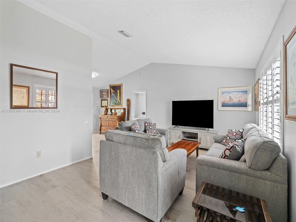 Photo of 2340 SE Charleston Dr, Port Saint Lucie, FL 34952 (MLS # A11585394)