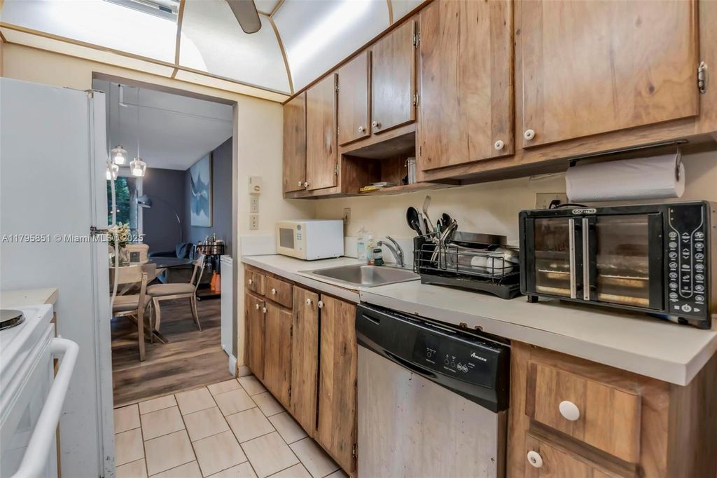 Photo of 3321 NW 47th Ter #330, Lauderdale Lakes, FL 33319 (MLS # A11795851)