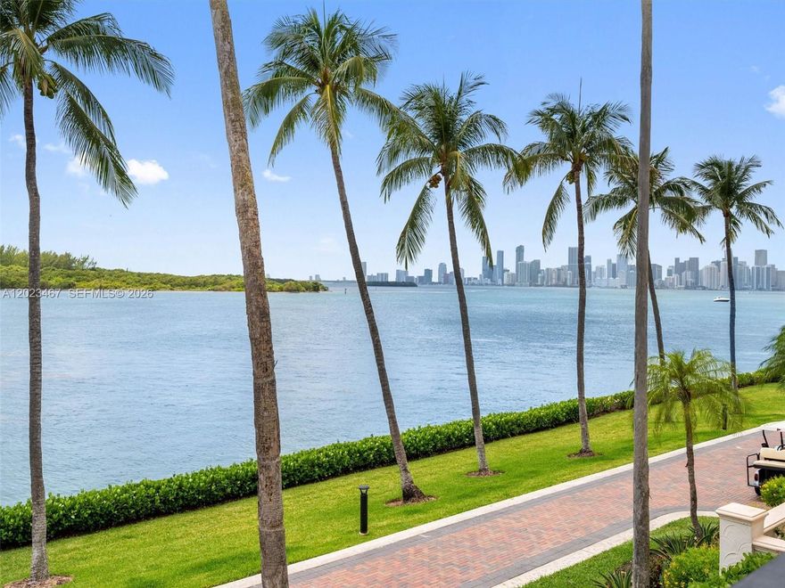 Live the Fisher Island lifestyle in this renovated Bayside Village condo on Fisher Island! This residence showcases 2 bedrooms + 2.5 baths, offering breathtaking views of the Miami downtown skyline, Virginia Key, and Biscayne Bay. Features include 1,912 sq ft interior, an open layout with an updated gourmet kitchen, granite countertops serving as the centerpiece for sophisticated gatherings, a primary suite with a walk-in closet, updated bathrooms, California closets, marble and tile floors that flow elegantly throughout. Visit this exceptional unit where tranquil bayside serenity meets the vibrant energy of the city, only moments away.