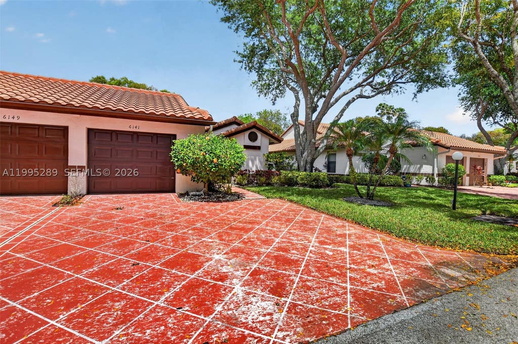 Photo of 6141 SE Sunny Pointe Cir, Delray Beach, FL 33484 (MLS # A11995289)