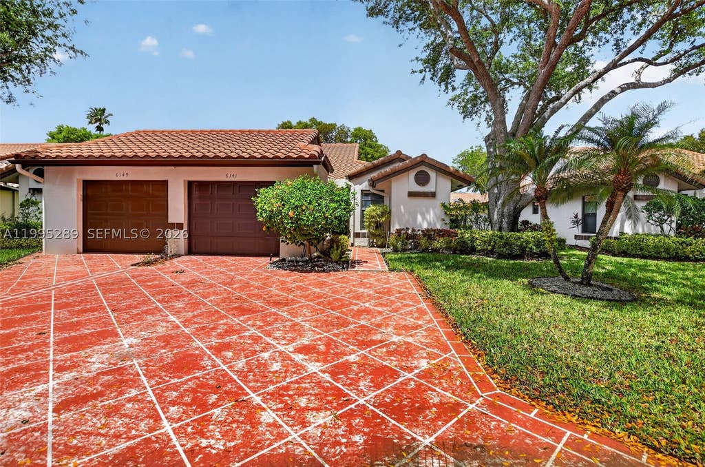 Photo of 6141 SE Sunny Pointe Cir, Delray Beach, FL 33484 (MLS # A11995289)