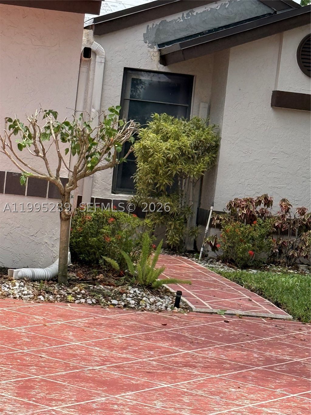 Photo of 6141 SE Sunny Pointe Cir, Delray Beach, FL 33484 (MLS # A11995289)