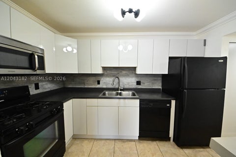 Photo of 6900 N Kendall Dr #A209, Pinecrest, FL 33156 (MLS # A12043182)