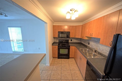 Photo of 6900 N Kendall Dr #A209, Pinecrest, FL 33156 (MLS # A12043182)