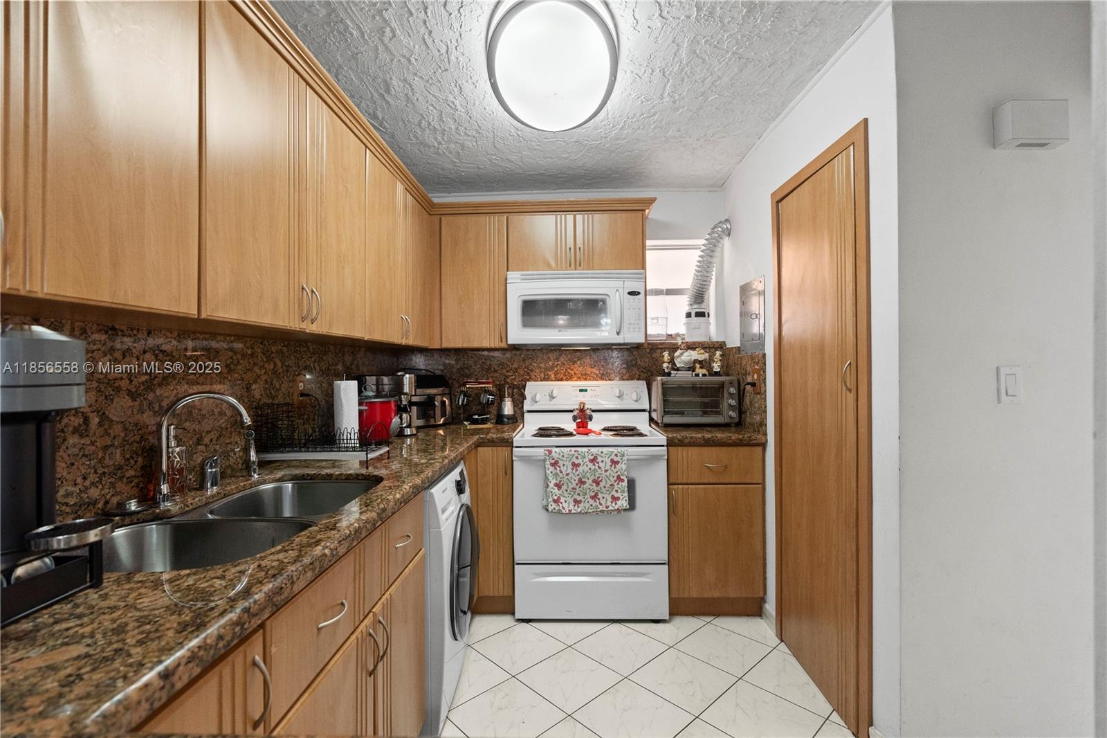 PALM-EAST GARDENS CONDO - Residential