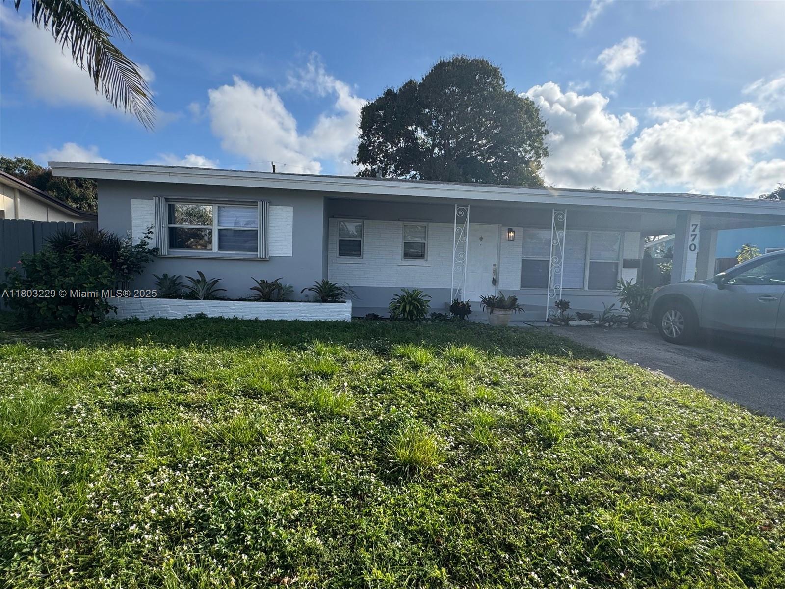 770 NW 38th St