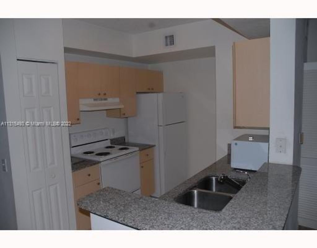 Photo of 2430 Centergate Dr #105, Miramar, FL 33025 (MLS # A11315493)