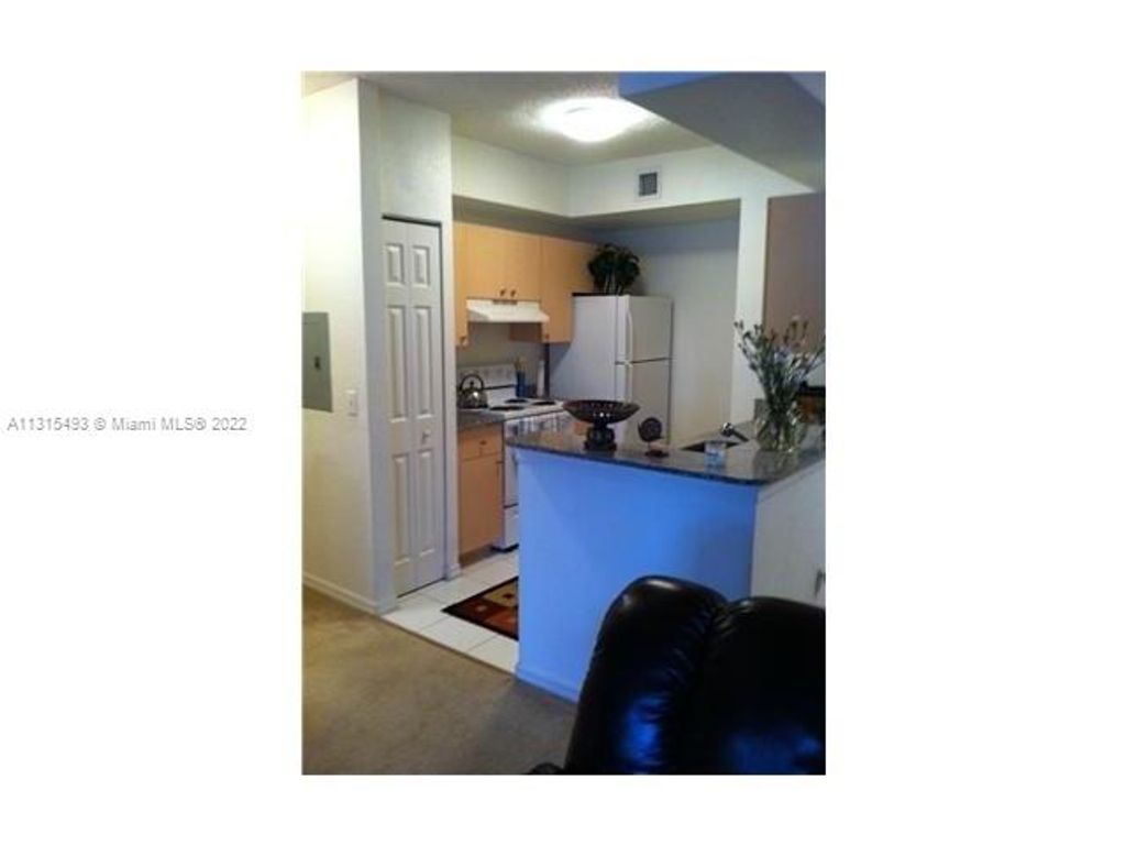 Photo of 2430 Centergate Dr #105, Miramar, FL 33025 (MLS # A11315493)