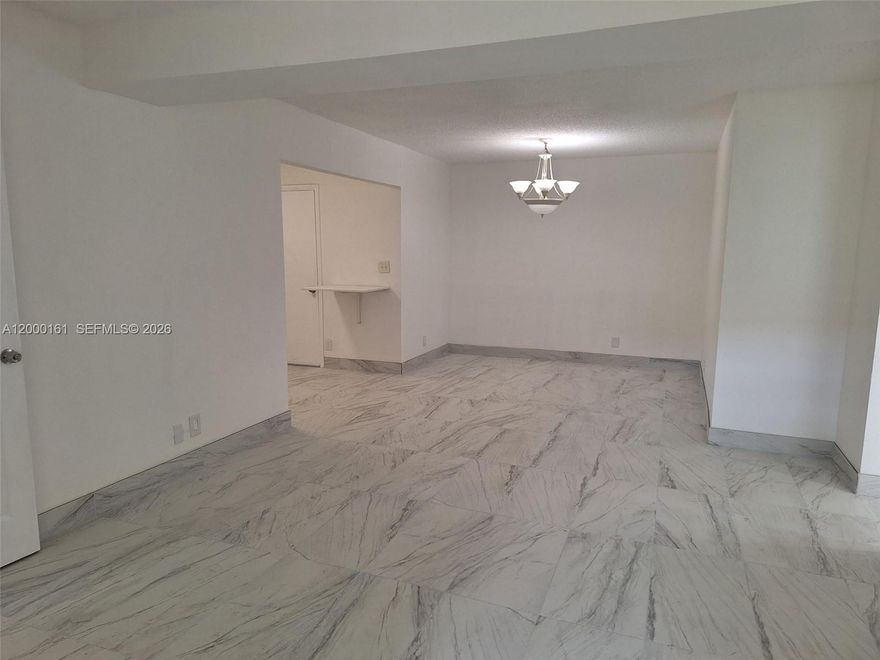 Totally updated first floor unit in Royale Green. New modern flooring, white kitchen, new bath, washer and dryer inside unit, a flex  room that can be used as office, den or a 3rd bedroom, one assigned parking space and plenty of open spaces. Centrally located and only minutes to hospital, schools, shoppng and Turnpike.Vacant and ready to move in.