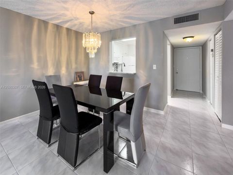Photo of 7145 Huntington Ln #303, Delray Beach, FL 33446 (MLS # A12020307)