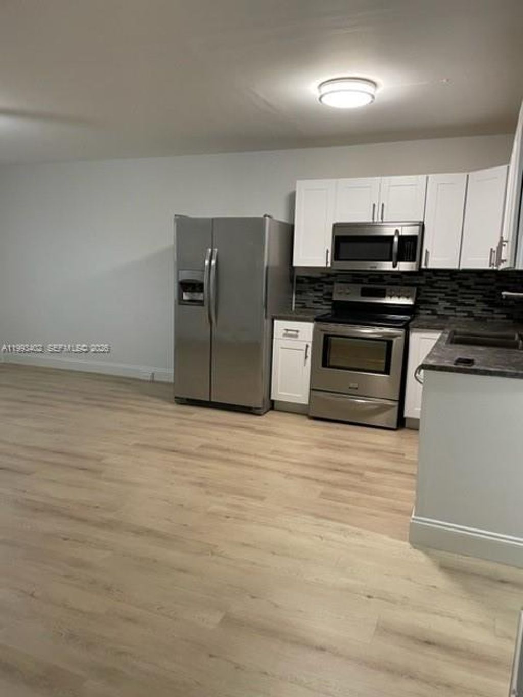 Photo of 251 SW 132nd Way #204H, Pembroke Pines, FL 33027 (MLS # A11993402)