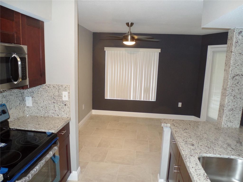 Photo of 2647 NW 33rd St #2313, Oakland Park, FL 33309 (MLS # A12011520)
