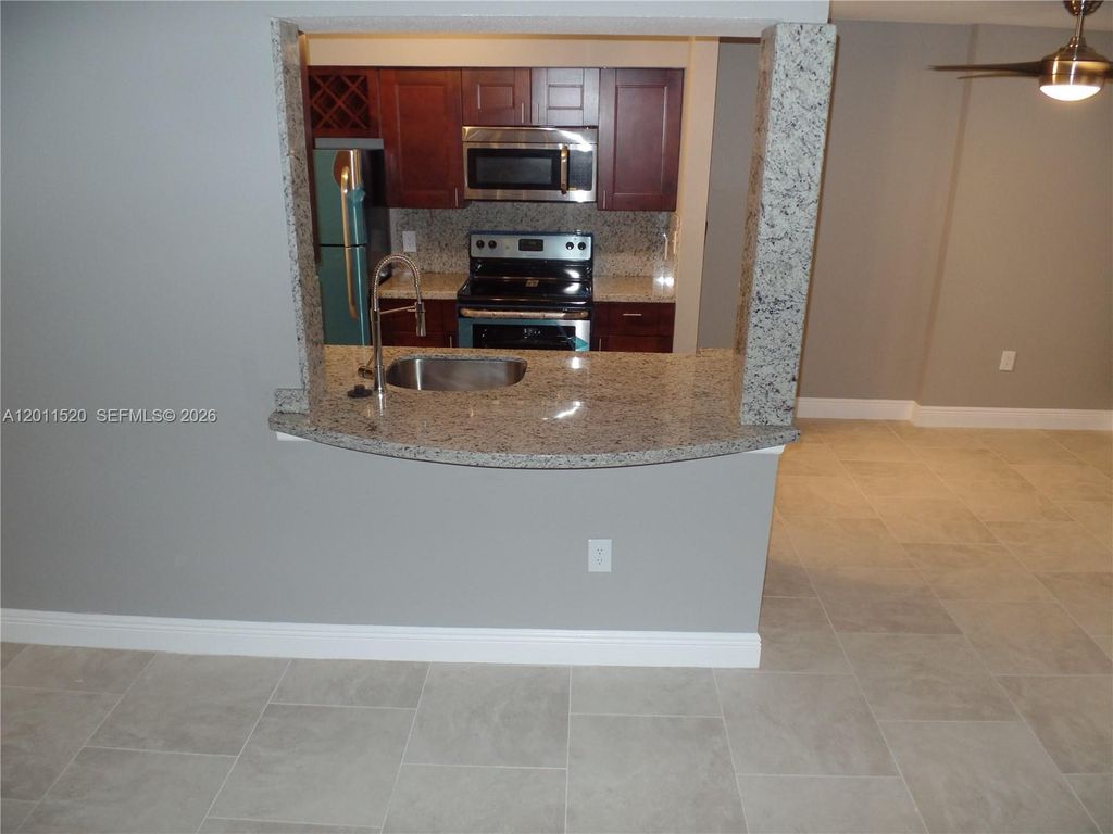 Photo of 2647 NW 33rd St #2313, Oakland Park, FL 33309 (MLS # A12011520)
