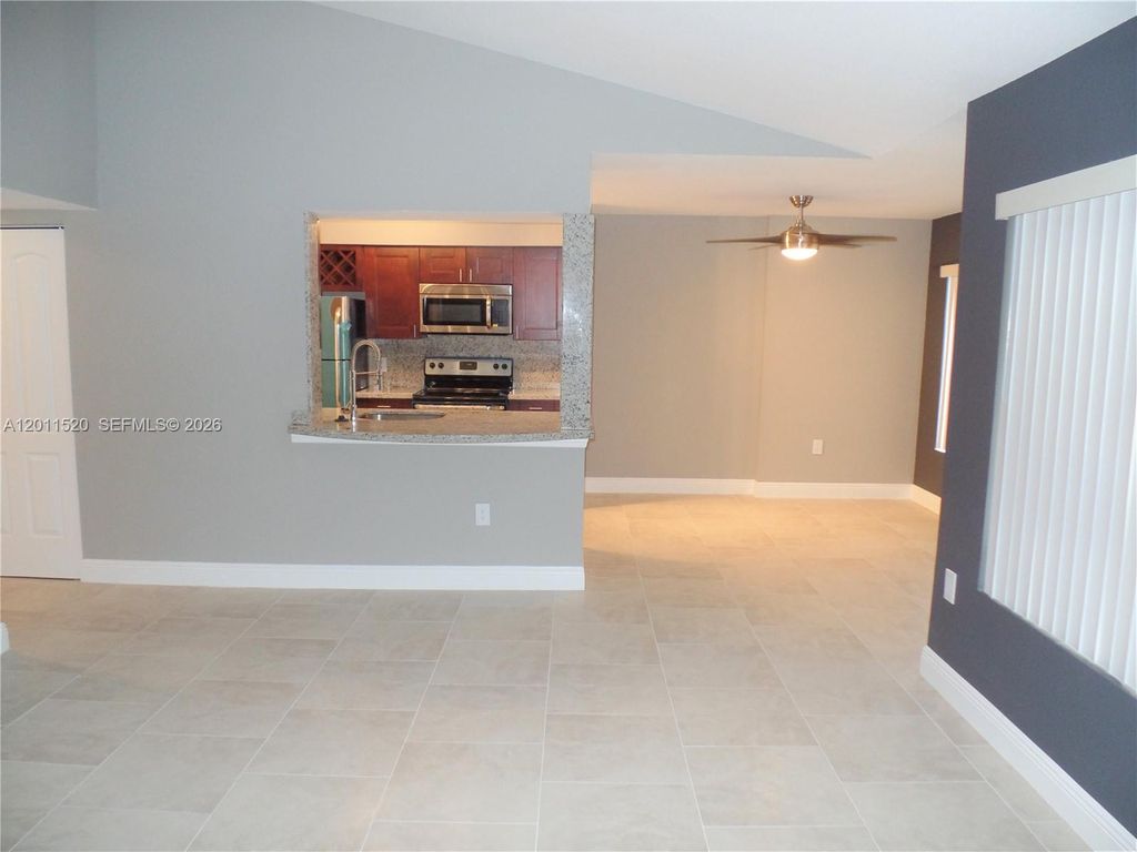 Photo of 2647 NW 33rd St #2313, Oakland Park, FL 33309 (MLS # A12011520)