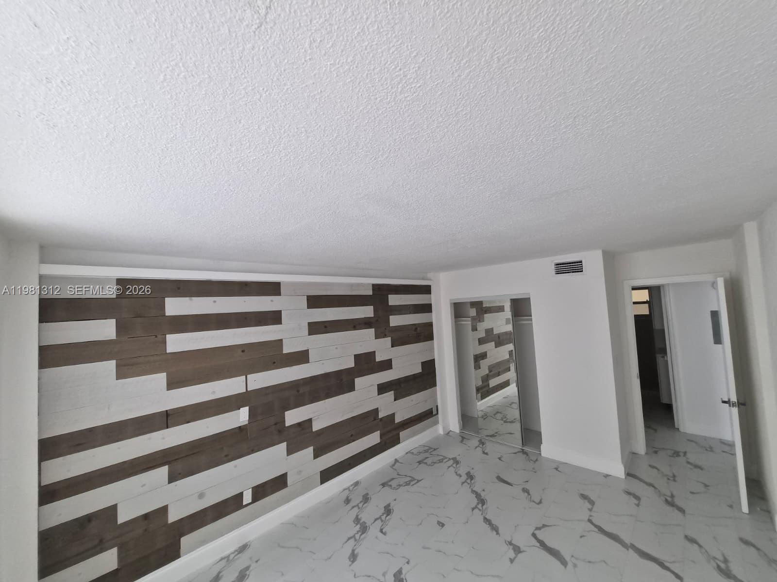 THREE SEASONS CONDO BLDG - Residential