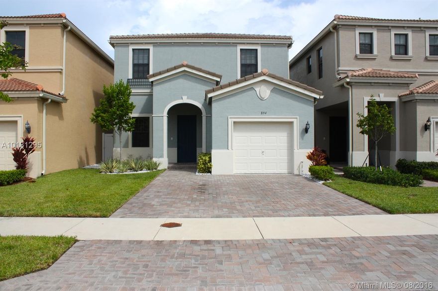 Imagine a lifestyle of affordable luxury in an elegant, gated community. The convenience of being minutes from  Aventura, fabulous shopping, fine dining, 2 airports and sandy beaches is priceless. The exquisite community offers large sparkling pool, playground and trails with exercise stations. This lovely home is immaculate and flawless. Includes all the upgrades that the builder had to offer. Sound proof doors, granite counter tops, ss appliances, led lightning. Fenced back yard w/room for a pool.