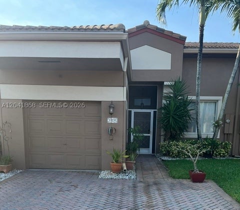 Photo of 10136 Lombardy Dr, Tamarac, FL 33321 (MLS # A12041868)