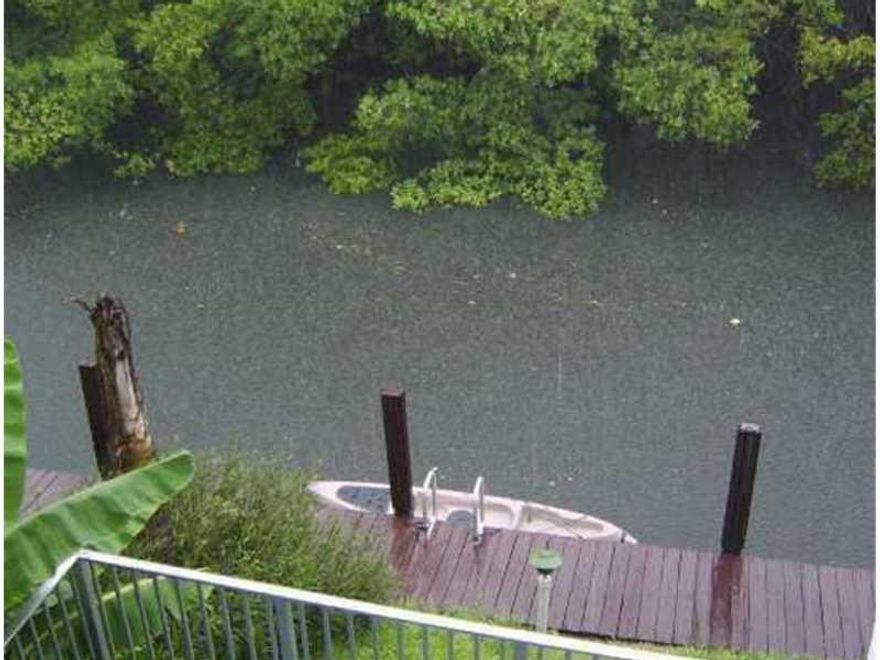 QUAINT CONDO IN THE HEART OF NORTH MIAMI BEACH WITH 30'BOAT SLIP. CHARMING TRANQUIL CANAL VIEW. WOOD CABINETS KITCHEN, TILE LIVING AREA. CENTRAL A/C AND ENERGY EFFICIENT WATER HEATER. ACCORDIAN SHUTTERS. NEAR FIU/ STARBUCKS. ONLY ONE FIXED BRIDGE & 5 MILE S TO HAULOVER INLET...A MUST SEE!