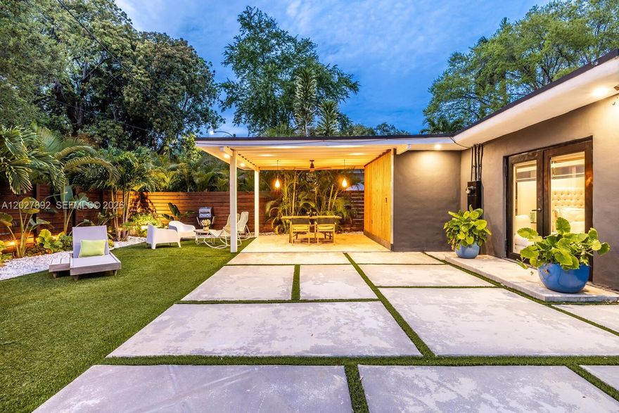 Move right into this exquisitely renovated 3/2 residence in Miami’s highly desirable Upper East Side. Designed with a modern open-concept layout, the home showcases a stunning chef’s kitchen, designer bathrooms, premium finishes, and abundant natural light throughout and gated parking for 3 vehicles. Recent upgrades include impact windows and doors, updated electrical and plumbing systems, air conditioning, and beautifully curated indoor and outdoor spaces. The private backyard offers the perfect setting for entertaining or creating your own tropical retreat. Ideally located just minutes from the vibrant MiMo District, renowned dining, boutique cafés, the Miami Design District, Wynwood, Biscayne Bay, and Miami Beach. A rare turnkey opportunity combining style, location, and effortless South Florida living. NO FLOOD ZONE