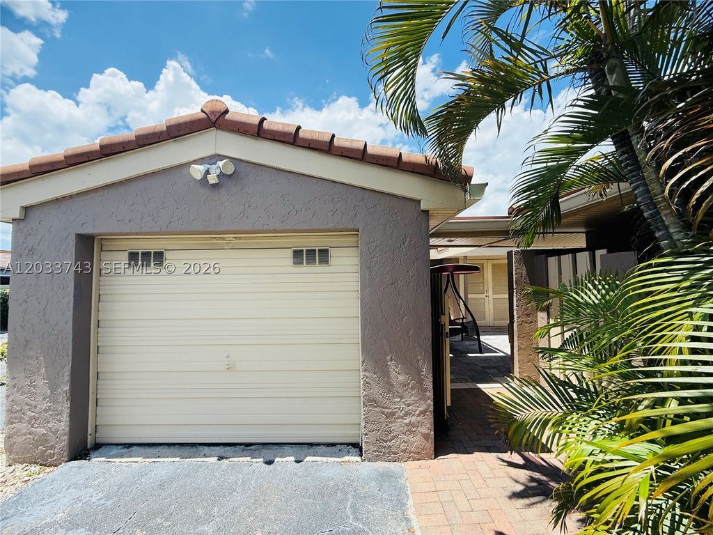 Photo of 103 Tweedbrook Ln #101, Hollywood, FL 33021 (MLS # A12033743)