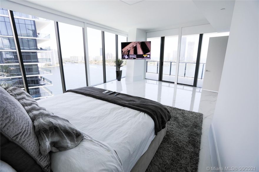 Lowest priced per square foot in Privé. Stunning corner unit with 270-degree views. 4, 125 sq. ft (with Terrace). 4 bedroom 5 1/2 bathroom apartment in the exclusive new development located on Prive Island in Aventura. Electronic blinds across. Enjoy the breathtaking views of the ocean, sandy beaches, and city lights coupled with elite accommodations, world-class service, and five-star amenities including cigar lounge with private humidors, private wine storage cellars, library, billiard room, media room, business center, restaurant, kid's playground, gym, spa, tennis courts, full-service beach, and pool. Residents of all ages and interests are sure to enjoy the island lifestyle which is centrally located near wonderful restaurants, superb shopping, and top-rated private / public schools.