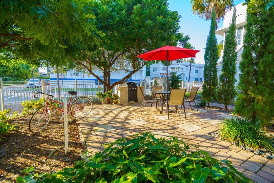 **MOVE IN SPECIAL FOR QUALIFIED APPLICANTS!** Move-in NOW with just 2 months !**Embrace the beach lifestyle in this charming 1 BD, perfectly situated in a peaceful neighborhood just a footbridge away from the ocean & the scenic 8-mile Beachwalk. This inviting apartment boasts a spacious living area,original hardwood flooring, a modern kitchen with SS appliances including a dishwasher & microwave, in-unit washer & dryer, central A/C,impact windows,an updated bathroom,a walk-in closet, & abundant natural light.The building offers a secured entrance & a picturesque courtyard w/ an outdoor table & BBQ area.Enjoy easy access to the library, Bass Museum, Scott Rakow Center, & the Convention Center.Pets are welcome!Water billed accordingly.Check out our VIRTUAL TOUR!