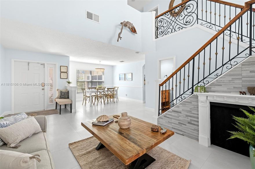 Unique, a gem 3-bedroom, 2.5-bathroom home located in the serene Coco Palms community of Coconut Creek. Foyer seamlessly flows into formal living/dining rooms, captivating staircase, open concept, with 20 ft+ volume ceilings & tall bay windows allowing tons of natural light. Owners suite boasts walk-in closet, & spa-like bathroom. Backyard oasis is fenced, has mature landscaping & complete privacy. Substantially renovated home from roof, plumbing (no poly-pipes), 42" solid wood cabinetry, new dual ice maker refrigerator, quartzite countertops, and brand-new owner's bathroom w/high quality finishes & materials. Add exterior highlights: New 2020 barrel tile roof/PGT high impact doors/windows w/additional shutter/panel for double protection. HOA requires 650 credit score. Come fall in love!