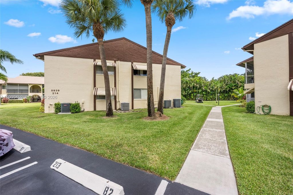 Photo of 5839 La Pinata Blvd #C-2, Green Acres, FL 33463 (MLS # A12000459)