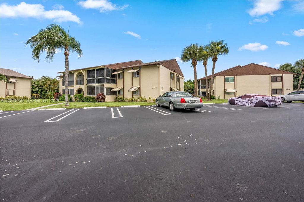 Photo of 5839 La Pinata Blvd #C-2, Green Acres, FL 33463 (MLS # A12000459)