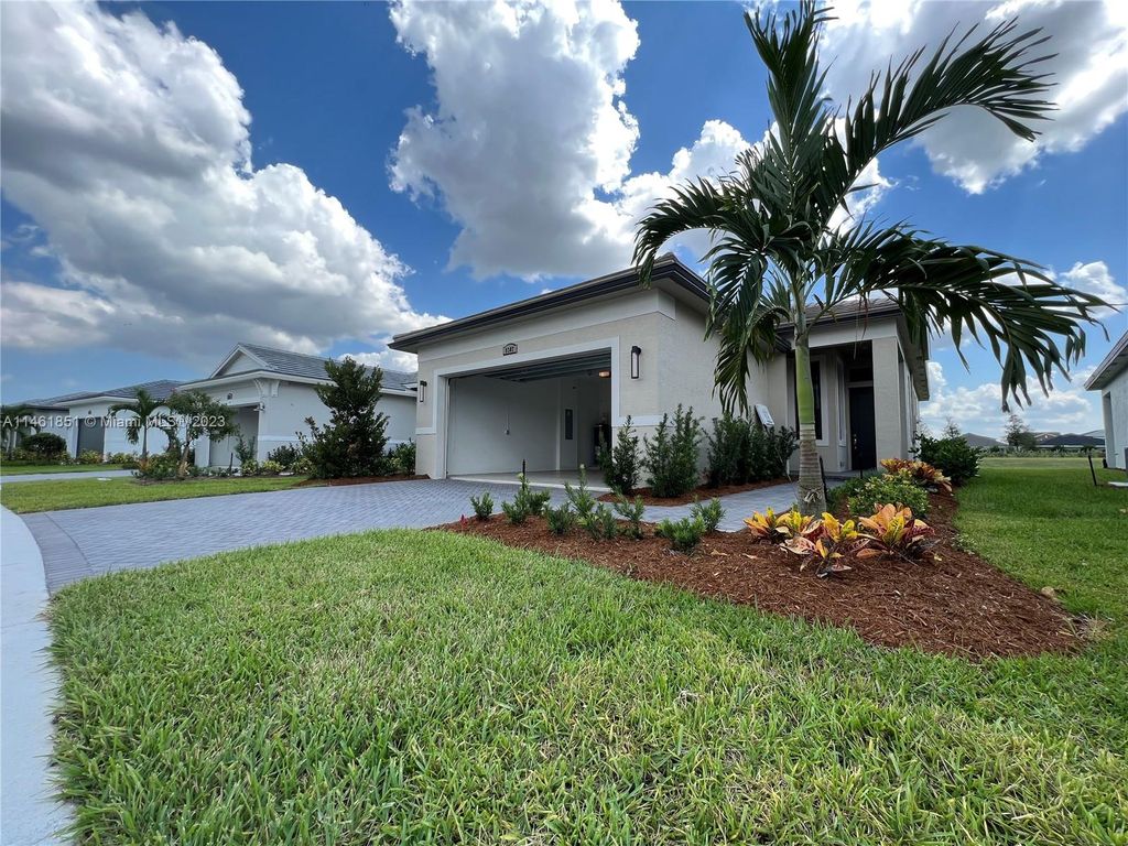 Photo of 9387 SW Pepoli Way #9387, Port Saint Lucie, FL 34987 (MLS # A11461851)