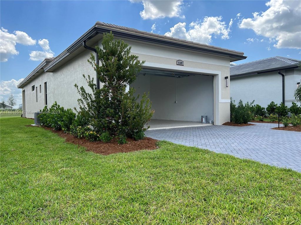 Photo of 9387 SW Pepoli Way #9387, Port Saint Lucie, FL 34987 (MLS # A11461851)