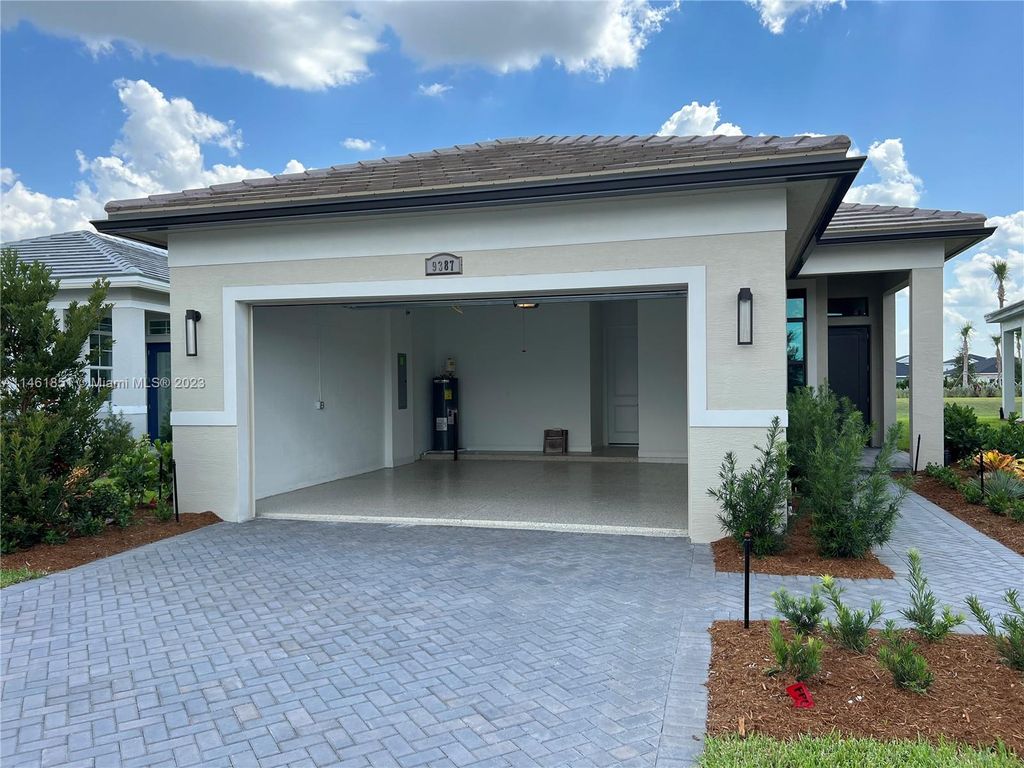 Photo of 9387 SW Pepoli Way #9387, Port Saint Lucie, FL 34987 (MLS # A11461851)