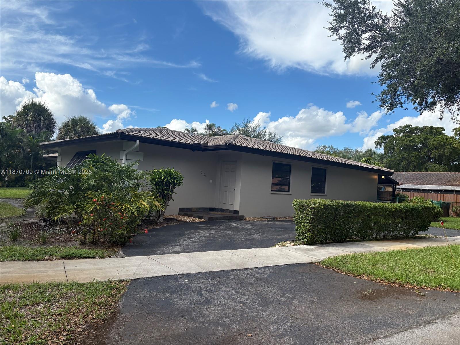 “Beautiful and spacious 3 bedroom 2 full bath corner home in the heart of Miami Lakes, with a spacious patio and serene backyard perfect for relaxing. Tile flooring throughout, and a prime location near shopping, dining, and major highways "Great schools throughout.