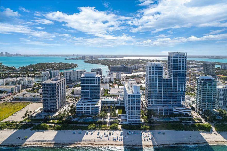 From ocean sunrise to city sunset, experience Miami Beach at its finest in the only combined Lower Penthouse at Carillon Miami Beach. This one-of-a-kind sky estate spans 3,155 SF with a dramatic 1,040 SF terrace 52 ft long and 10 ft deep framing unobstructed 180° views. Interiors include a Bulthaup kitchen, Poliform closets, Cappadocia porcelain tile, Philippe Starck baths with Dornbracht fixtures, and Lutron smart lighting. Ownership offers two private parking spaces, valet, and 16 memberships to Carillon’s 60,000 SF spa & wellness center with oceanfront pools, thermal suites, curated programs, dining, concierge, and 750 ft of beachfront. A rare fusion of space, style, and wellness.