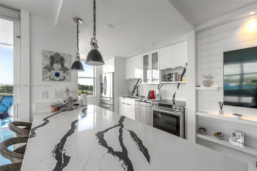 Photo of 2639 N Riverside Dr #501, Pompano Beach, FL 33062 (MLS # A12010632)
