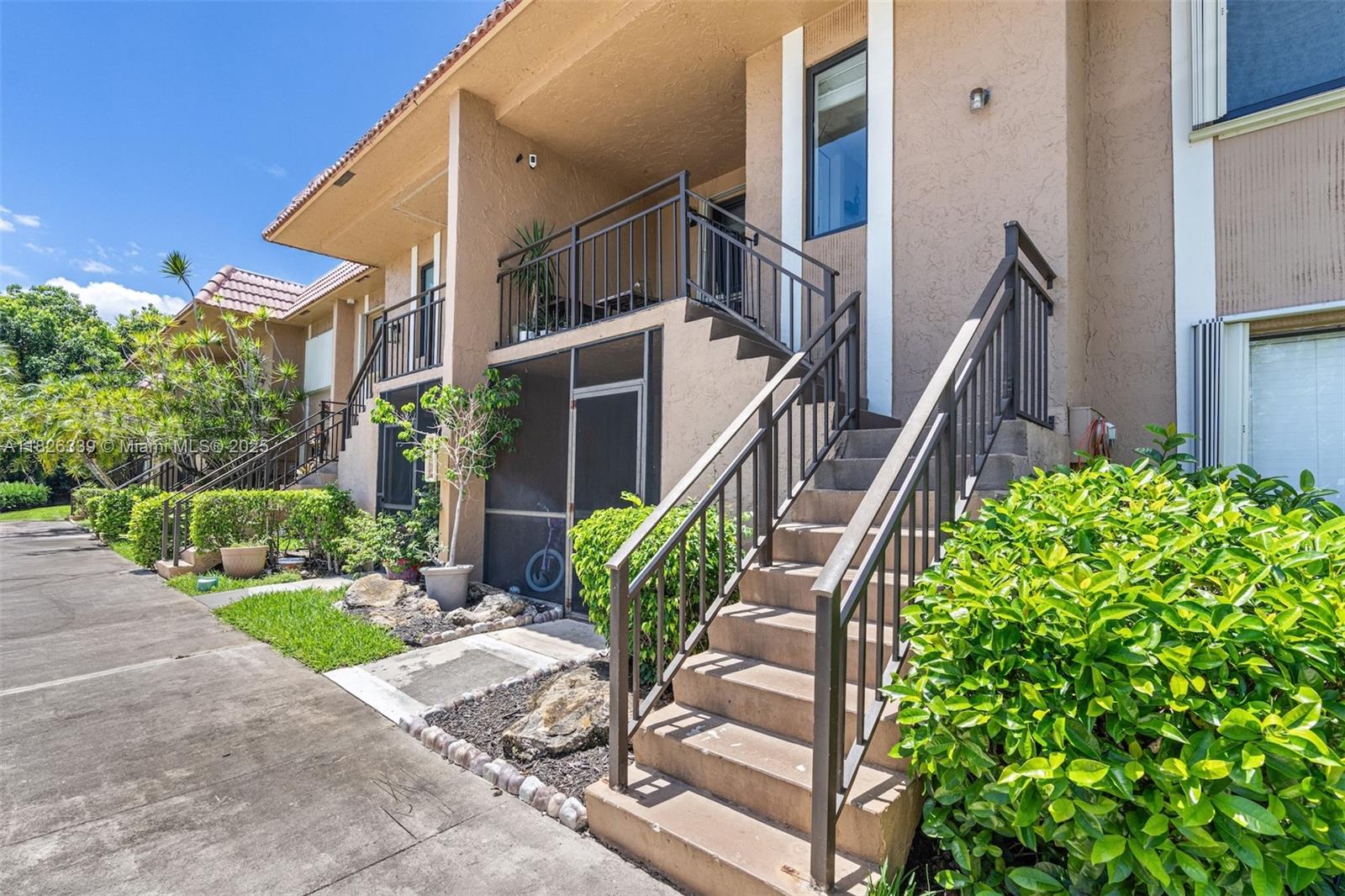 Look no further! Beautifully updated 2BR/2BA condo in Weston! Features remodeled bathrooms, an updated kitchen with new appliances, hurricane impact windows/sliding door, and an in-unit washer/dryer. Enjoy serene water view from the balcony and access to A-rated schools. No rental restrictions make it ideal for owners or investors. Residents have access to the Bonaventure Town Center Club ($385/yearly) with gym, sauna, tennis, basketball, pickleball, pools and so much more. Assigned parking right in front of unit, plenty of guest spaces, a newer roof (2018), and a community pool just steps away. Monthly HOA includes water, lawn care, building exterior, and roof!