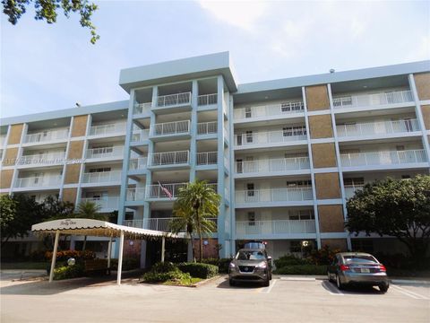 Photo of 3100 N Course Ln #502, Pompano Beach, FL 33069 (MLS # A11874942)
