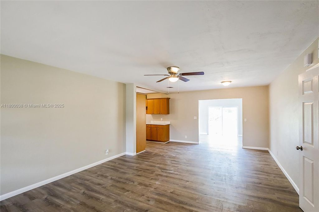 Photo of 311 NW 42nd St, Deerfield Beach, FL 33064 (MLS # A11800038)