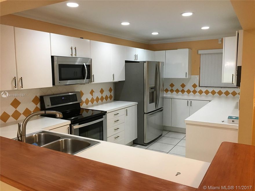 Amazing two story 2050 sq.ft. townhome in highly desirable Costa del Sol in the heart of Doral. Property located on the golf course. Updated kitchen and bathrooms. Oversize master bath with build in Jacuzzi. Lots of Storage Space & Closets; 3 Bed / 2 Baths are upstairs, 1/2 Bath downstairs & a Large Living area. Covered Parking. 24-Hrs Gated Security. Pool, Playground, Basketball & Tennis Court.