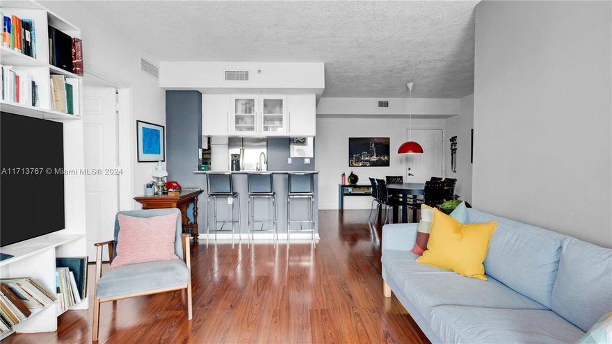 This outstanding unit in Miami’s vibrant Edgewater/Wynwood area perfectly combines style, comfort, and luxury. The remodeled kitchen, with stainless steel appliances and sleek quartz countertops, exudes sophistication. It also features a washer and dryer, making this impressive residence convenient. Residents can enjoy top-tier amenities, including a sixth-floor pool, a fully equipped gym, and easy access to the area’s dynamic dining and nightlife scenes. With partial views of the Intracoastal Waterway, this condo offers the ultimate Miami lifestyle. The unit includes two parking spaces, with the option to acquire a third space separately, ensuring unparalleled convenience.