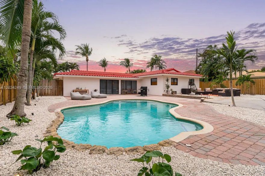 Welcome to 5250 NE 15th Ave, Fort Lauderdale — a true one-of-a-kind gem sitting on one of the largest lots in the area (11,400 sf). Whether you're searching for your primary residence or the perfect home to entertain family and guests, this beautifully renovated property offers abundant opportunities to live, relax, and create lasting memories.

Boasting over $250,000 in recent upgrades, this home has been upgraded with impact windows and doors throughout to provide year-round peace of mind and help keep your insurance costs low.

Inside, the thoughtful layout features 4 spacious bedrooms and 2 full bathrooms, with generous living spaces ideal for both everyday living and entertaining, as well as separate dining area. Step outside to your expansive lot — one of the most coveted in the neighborhood — offering endless potential for a pool, garden, or outdoor retreat.

Perfectly located just blocks from the prestigious Pine Crest School, and minutes from Fort Lauderdale's world-class beaches, top-rated restaurants, premier shopping, and easy I-95 access. Won't last long. Call Irene to schedule your private tour.