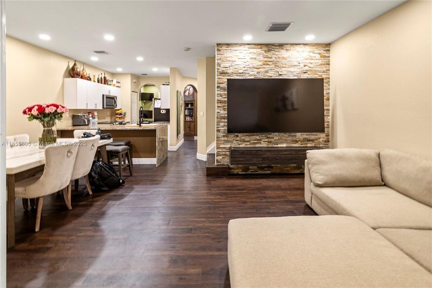 3 bedroom townhouse with beautiful rock wall in family room. Vinyl in all 3 upstairs bedrooms and tile downstairs. Stainless steel appliances and separate dining room. Granite counters, crown molding, ceramic tiles along with modern appliances, such as top loading washer & dryer available in this spacious town home with an extra room that can be used as an office/den/dining room. With a lovely community gym and pool . Only first last & security to move in with good credit and proof of income. Well kept association with community pool. Will not last!!!!