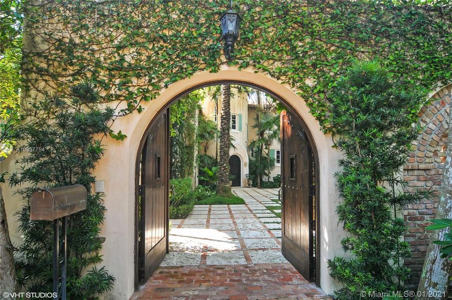 Designed by Walter DeGarmo, one of Miami's most historically significant architects, circa 1929, restored, maintained and updated to the highest standards of the 21st century, this residence of classic lines sits in one of Coconut Grove's finest in-town, gated addresses. This Mediterranean revival villa, on over ¾ acre, is a treasure of Coconut Grove. The charming foyer and formal living room with open wood beam ceilings, wood burning fireplace and stone mantelpiece, look out to gorgeous grounds and sparkling Biscayne Bay beyond. Also, there is a formal dining room , formal breakfast room, three family bedrooms with en-suite baths, plus a stunning, lavishly scaled master bedroom suite. Add a kitchen to delight, staff bedrm & bath, 2 car garage, and 1 bedrm guest house. To see is to buy!