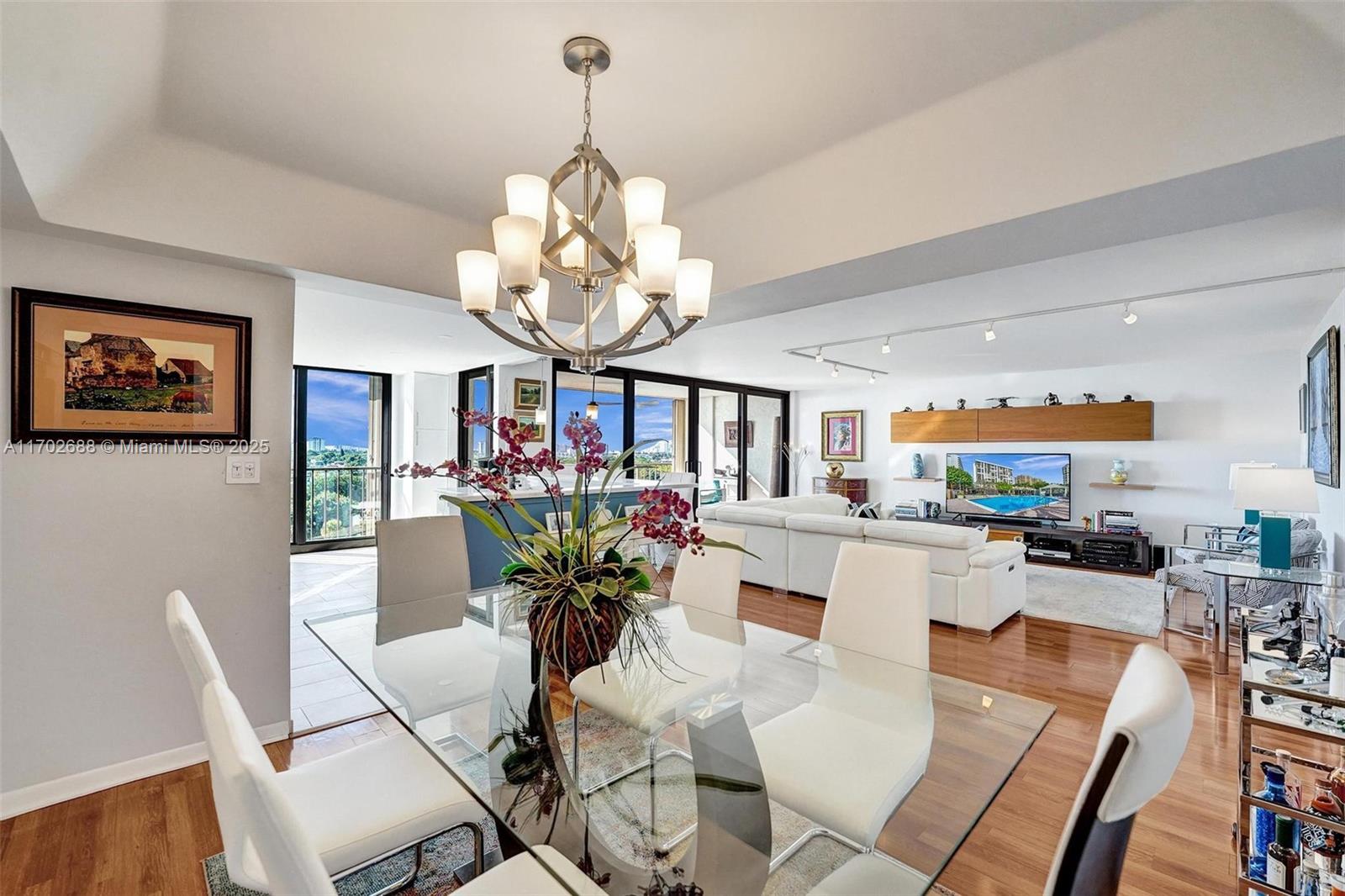 Stunning southeast exposure offers views of the Ocean, Coastline, Intracoastal and Skyline. Beautifully remodeled two bedroom, two bath open floor plan. Impact windows and doors along with hurricane shutters. Large balcony, semi-private elevator, garage parking spot with plenty of guest parking, two EV charging stations and additional storage. Oceanfront clubhouse, heated pool, hot tub, gym and grill area under tiki hut. Internet cable and 24/7 security. Great building, amenities and location!
