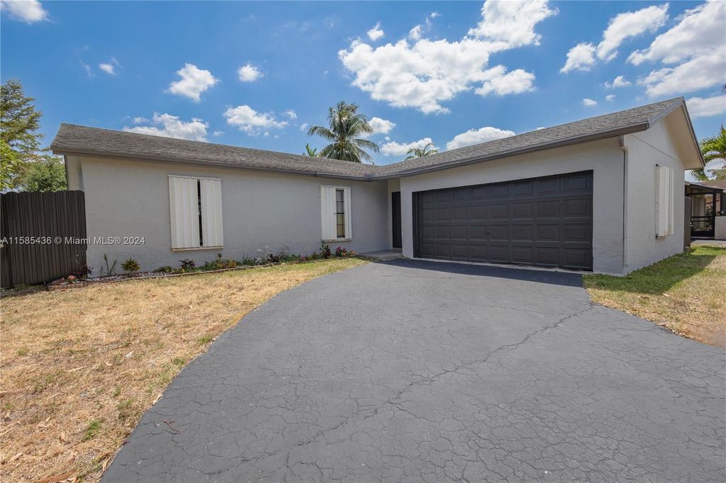 Photo of 10900 NW 28th St, Sunrise, FL 33322 (MLS # A11585436)