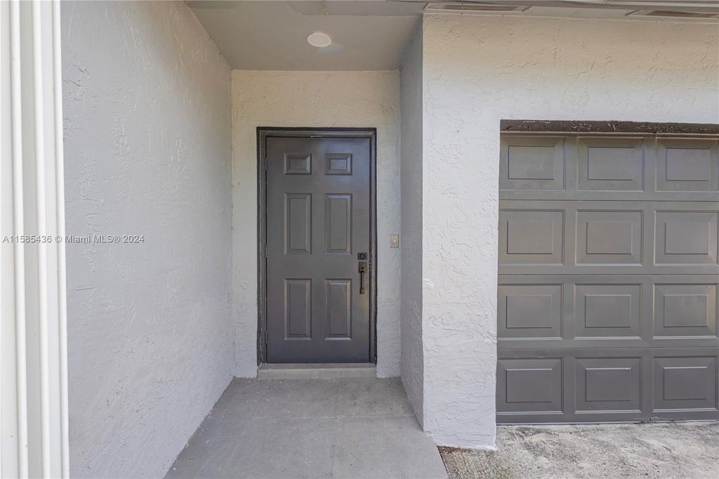 Photo of 10900 NW 28th St, Sunrise, FL 33322 (MLS # A11585436)