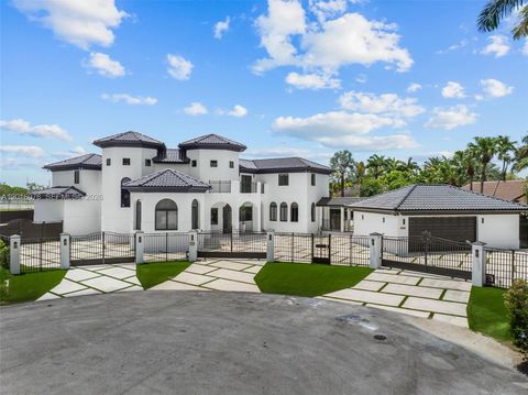 Photo of 9881 SW 148th Ter, Miami, FL 33176 (MLS # A12016076)