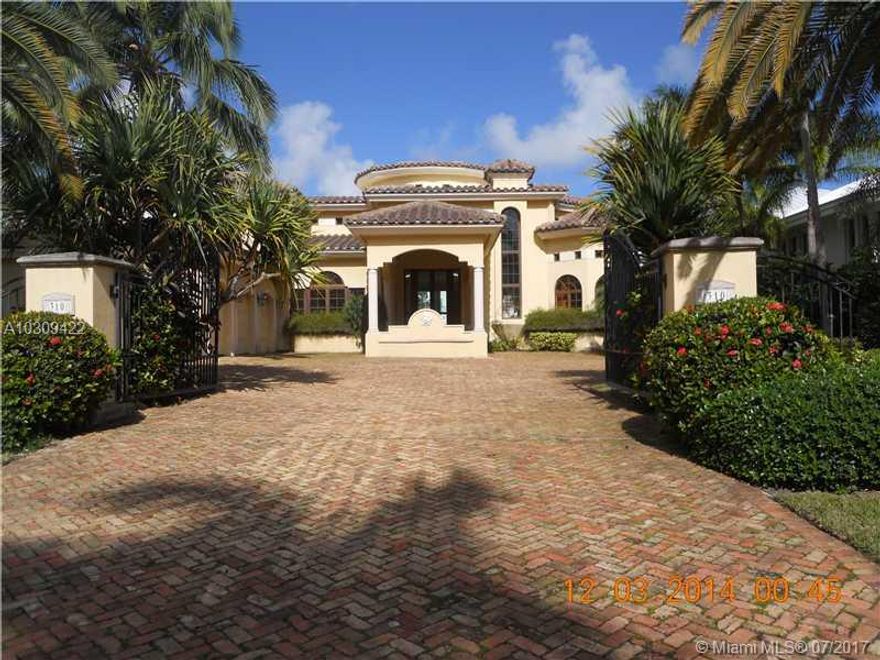 Fabulous Custom Built Mediterranean Home with Modern Overtones. Unrivaled Intracoasstal Views with 100
feet of Boat Dockage. Volume ceilings with Hand Painted Murals enhance the expansive Living room and Family
room.A Huge gourmet Kitchen also encompases Stunning Views. There are 6 Bedrms & 4.5 Baths, an Office
and a 3 Car Garage with a Lift for an additional Car.There are Impact Doors & Windows thru-out. This Unique
property is also Gated for Privacey