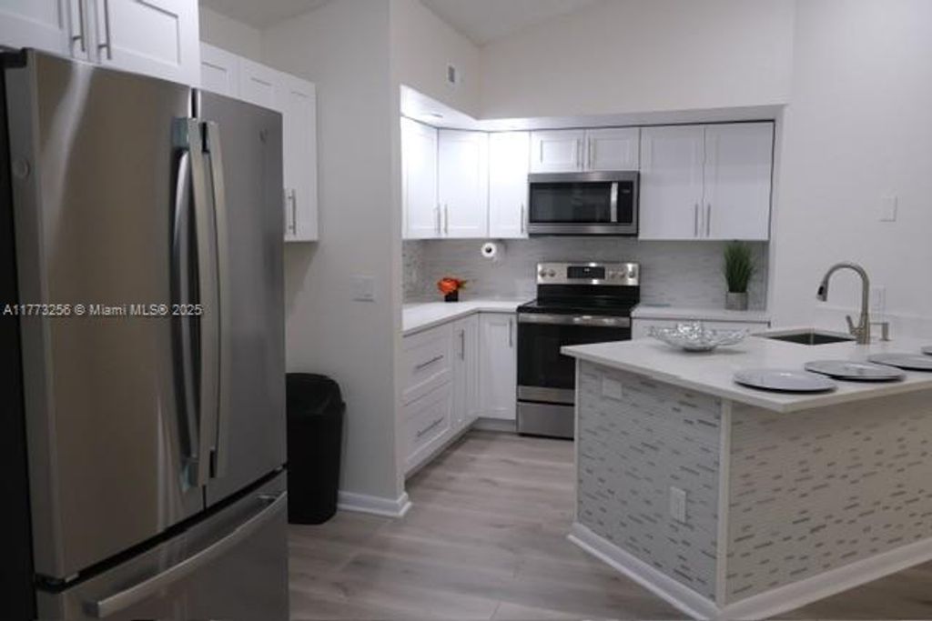 Photo of 1401 Village Blvd #137, West Palm Beach, FL 33409 (MLS # A11773256)